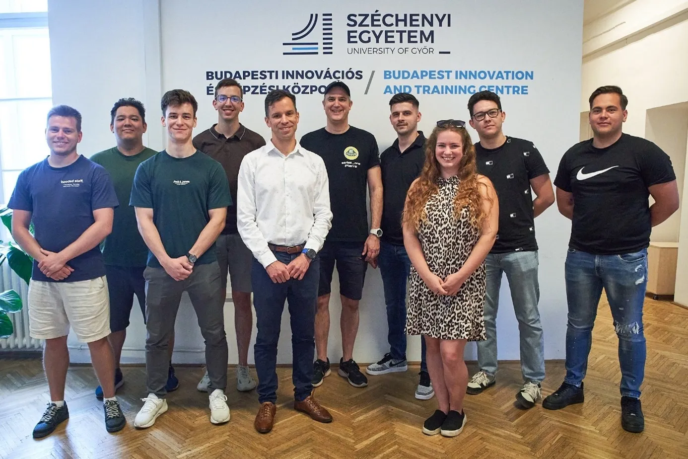 Dr Sándor Kling (fifth from the left) with Motorsport Engineering master's students at Széchenyi University. (Photo: József Bankó)